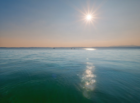 Lake view long exposure with sun starの写真素材