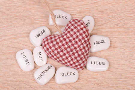 A decorative heart with German words aroundの写真素材