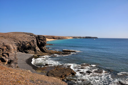 View along coast of volcanic canary island Lanzarote, Spain