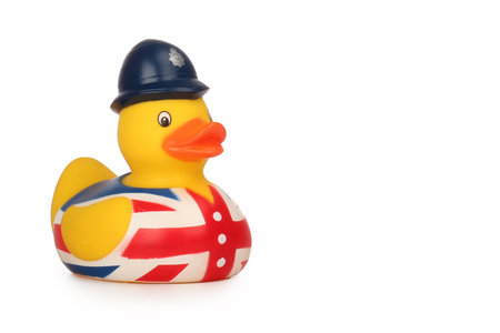 A bath toy duck with the British flag isolated on a white backgroundの写真素材