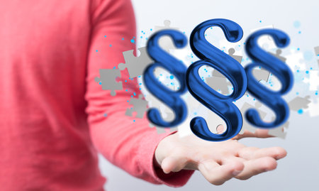 The 3d rendering of blue Section signs and puzzle pieces on the palm of the handsの写真素材