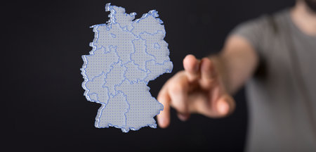 A germany map digital in hand 3dの写真素材