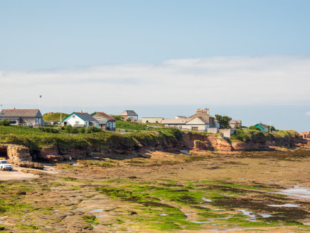 a mesmerizing view of hilbre island river with moss in wirral, ukの写真素材