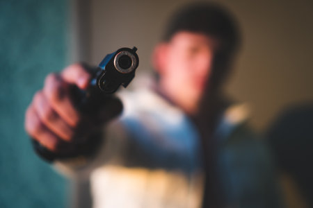 A selective of a gun pointing at the targetの写真素材