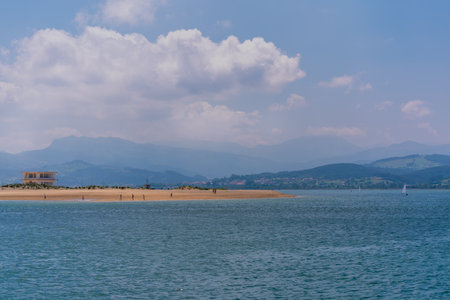 A beautiful shot of a seascape under the cloudy skの写真素材