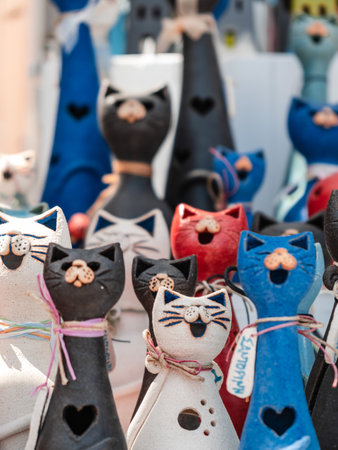 The adorable colorful cat souvenirs of Santoriniの写真素材