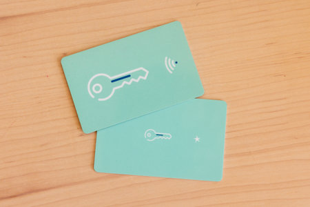 A top view of a hotel key card on a wooden tableの写真素材