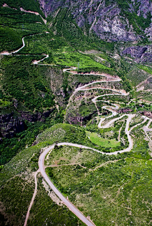 An aerial shot of serpentine road up to Tatev Monastery in Armenia