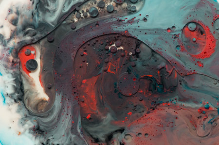 A top view shot of colorful paints in water - can be used as a background