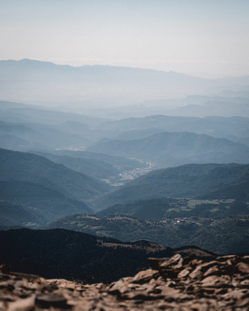 A beautiful mountainous landscape with a foggy backgroundの写真素材