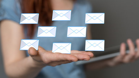 A close up shot of a woman's hand showing email marketing concept, send e-mail or newsletter 3Dの写真素材