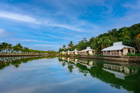 A Beautiful view of a Golden Sands Destination Resort and houses reflected  on a waterの写真素材