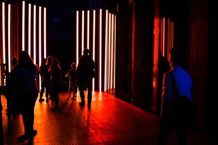 A group of people in a dark ro