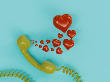 An old green wired telephone with romantic red hearts coming out of the speakerの写真素材