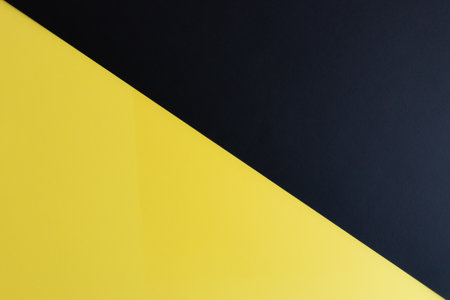 A closeup of a yellow and black surface with space for textの写真素材