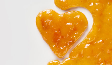 A top view of a delicious apricot jam textureの写真素材