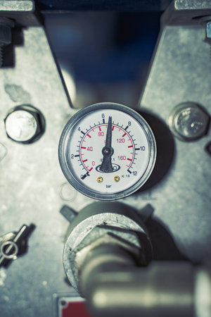 Pressure gauge showing the air pressure in the machineの写真素材