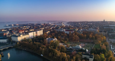 Aerial drone view of downtown Helsinki city, during hazy, autumn eveningの写真素材