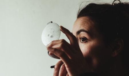 An Uruguayan woman doing makeupの写真素材