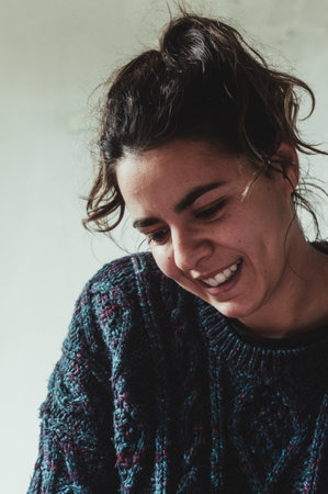 An Uruguayan young woman smiling happilyの写真素材