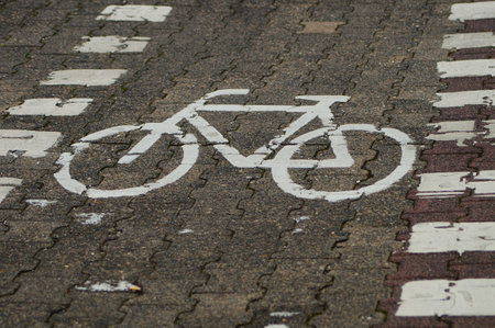 Road marking for a cycle path in the city of Frankfurt. Cycle lanes are currently being greatly...