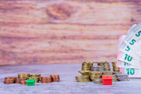 A closeup of coin stacks as a concept of rising real estate pricesの写真素材