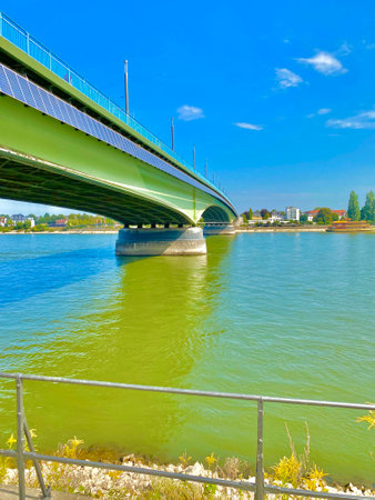 A vertical shot of a Rhine bridge Bonn with beautiful sky backgroundの写真素材