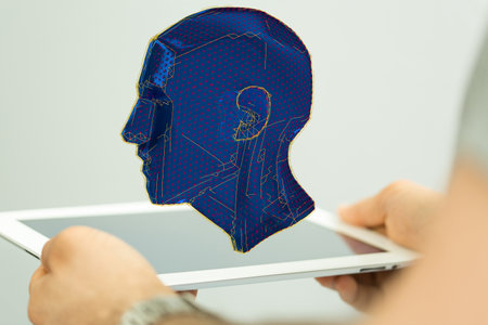 A 3D render of a holographic digital style human head conveying the ideaの写真素材