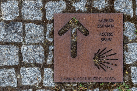 A top view of a sign for the Portuguese coastal path to Santiago de Compostelaの写真素材