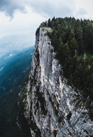 A vertical shot of a breathtaking landscape under the cloudy skiesの写真素材