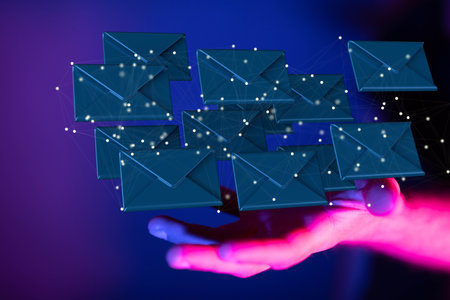 A 3D rendering of email icons floating on a man's hand against a blurred background