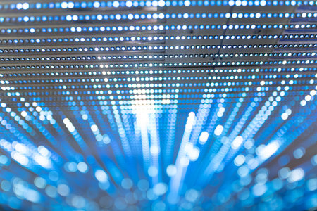 A motion blurred flash light of data and information transfer concept created with LED lights boardの写真素材