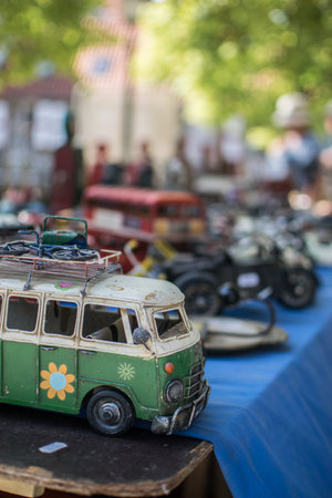A soft focus of a miniature toy Hippie van on display at a vintage shopの写真素材