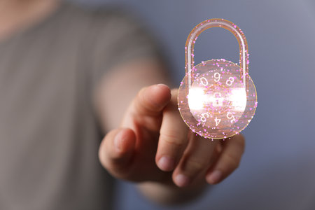 An abstract shot of a man touching a 3D rendered padlock for data protection, security on the webの写真素材