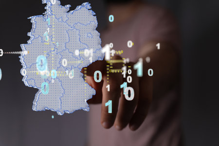 A close up shot of a man's finger touching 3D Germany map illustration in blockchain technologyの写真素材