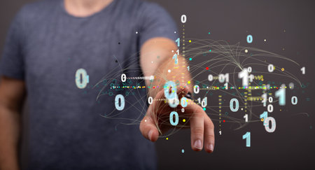 An illustration of binary codes and a human hand touching a transparent screenの写真素材