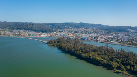 Rio Maule, constitucion, chile, horizontal aerial view with drone of the river and city, Island on the Riverの写真素材