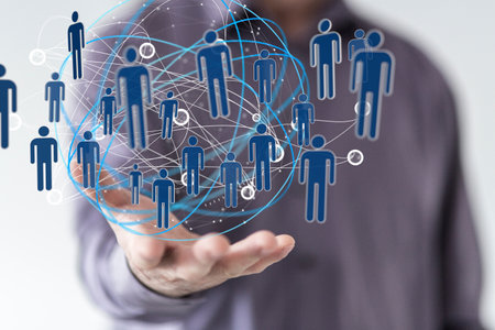 A 3D rendering of digital globe with human icons floating on hand- Digital Network and data conceptの写真素材