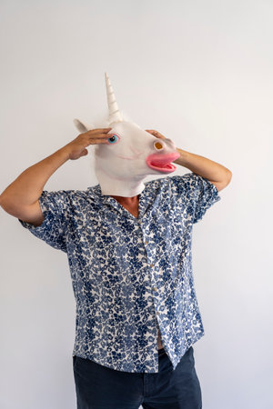 The man wearing a donkey maskの写真素材