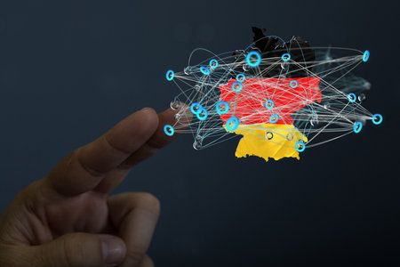 A 3D rendering of digital Germany map floating on human hands- internet and global connection conceptの写真素材