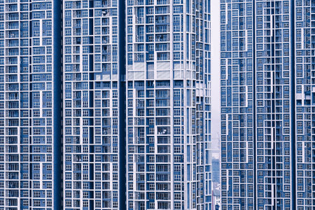 An exterior view of a modern architectural building with glass windows