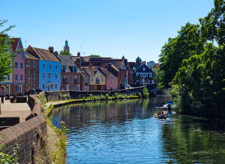 Old English houses at the riverside in Norwich in multi colorsの写真素材