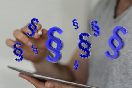 A person presenting the 3D render of paragraph section signs - law and justice conceptの写真素材