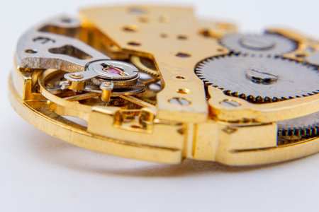 A closeup of the gears and parts of an automatic watchの写真素材