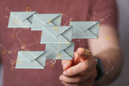 A hand showing email icon on screen - concept of business communicationの写真素材