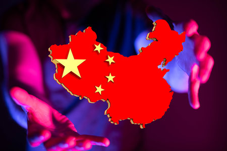 A 3d illustration of the Peoples Republic of China Flag floating on a man's handの写真素材
