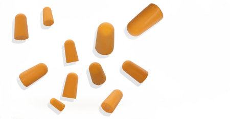 silicone, foam, orange plugs in various sizes floating on a white background, protection against...