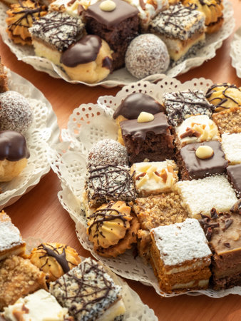 An assortment of tasty pastries in a dessert buffetの写真素材