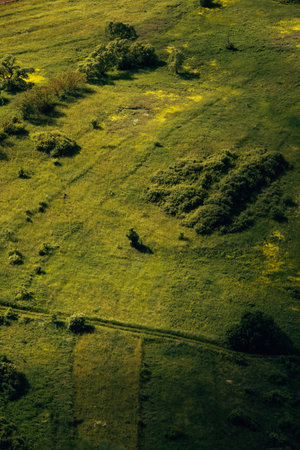 A vertical shot of a beautiful mountainous landscape with greeneryの写真素材