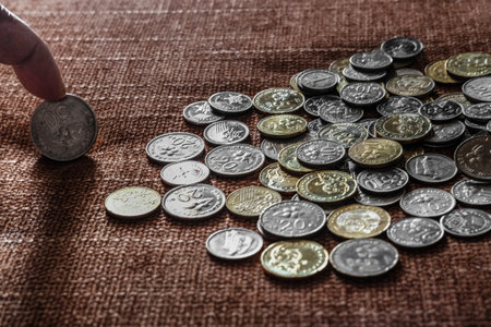 A pile of metal coins on a couch